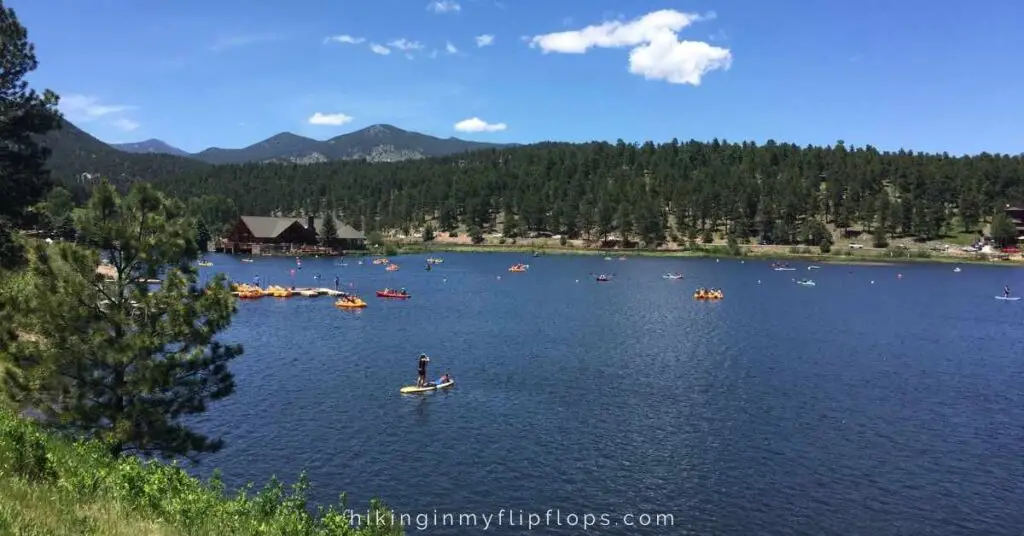 paddleboards and kayaks on Lake Evergreen, a favorite activity in Evergreen Colorado