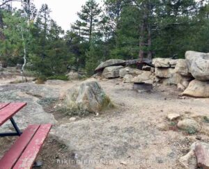 rocky campsites at hermit's hollow campground in colorado are fun for kids to climb and play