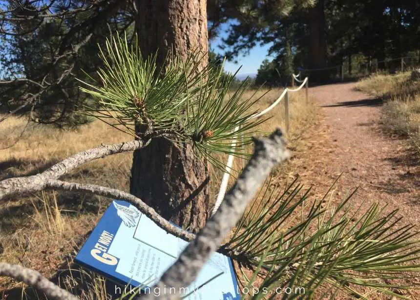 a sign along a Boulder hiking trail with instruction to use other senses to experience nature