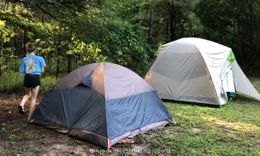 two camping tents set up at a campground; how to choose a tent for your family