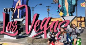 kids in front of a Las Vegas sign showing things to do in Las Vegas with kids