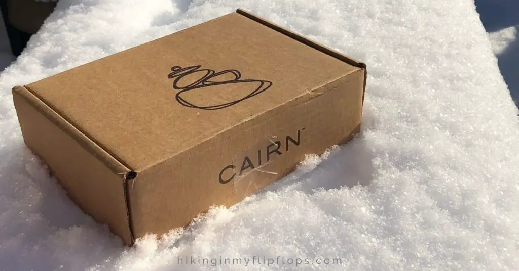 cairn subscription box with a snowy background