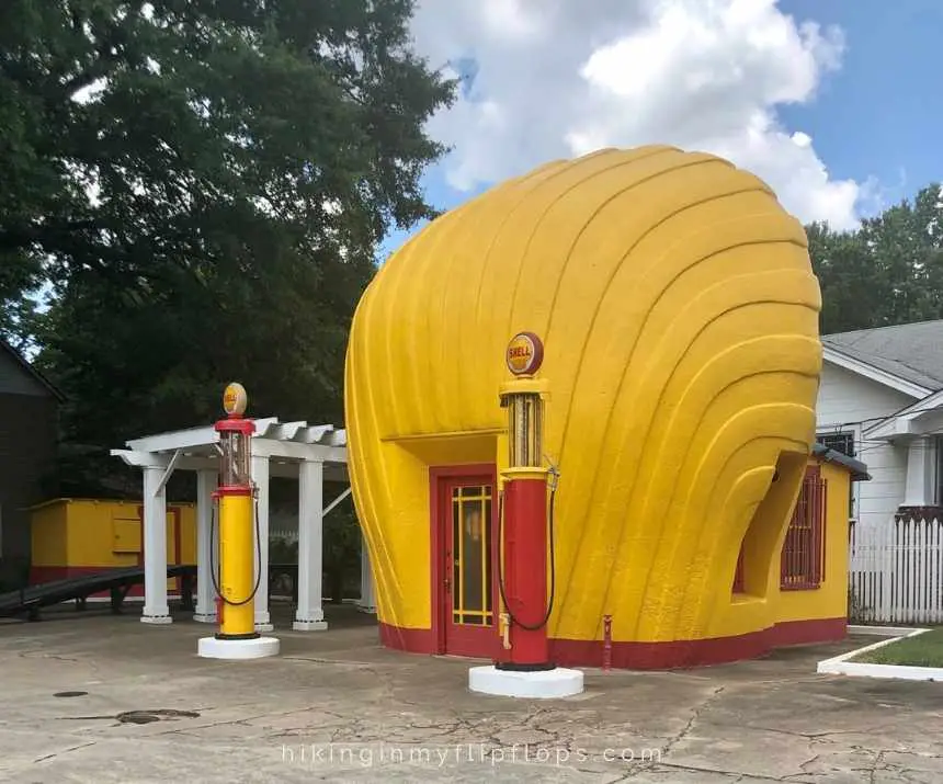 an old Shell Station with the entrance in the shape of the Shell Station logo