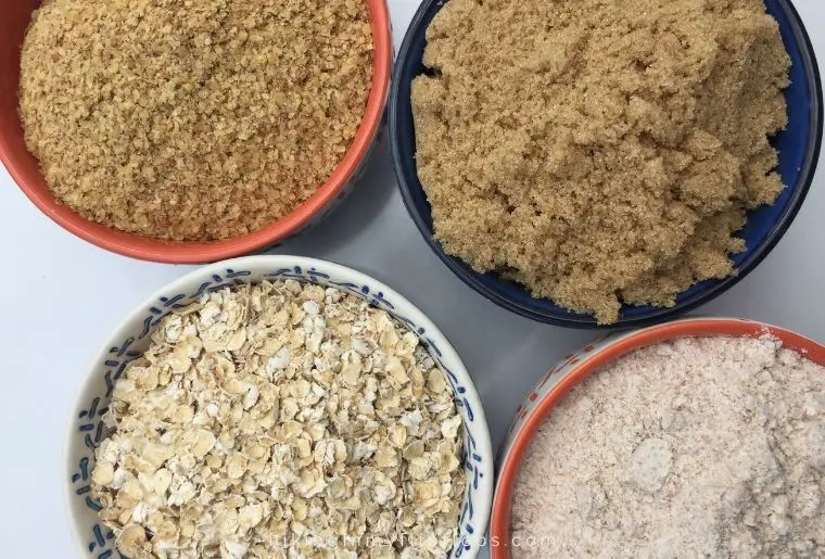 bowls with flour, sugar, oats, and wheat germ for hiking snack bars