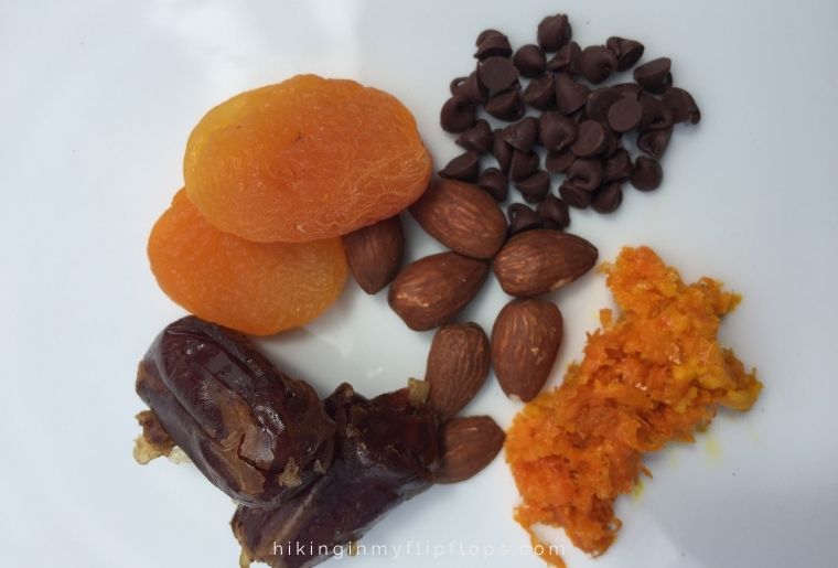 dried fruits and nuts for hiking snack bars on a plate