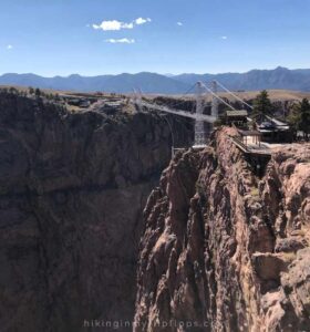a view of the Royal Gorge Bridge; walking across the bridge over the gorge is one of the top things to do in canon city, Colorado
