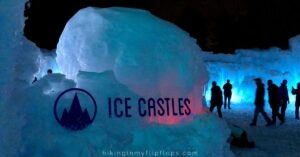 Ice Castles sign at the entrance at night