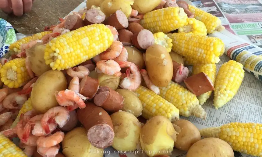 a shrimp boil; eating fresh caught seafood is a favorite of things to do on Dauphin Island