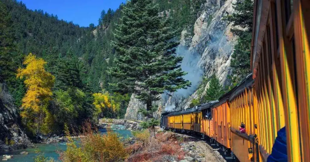 a train running through the Colorado mountains