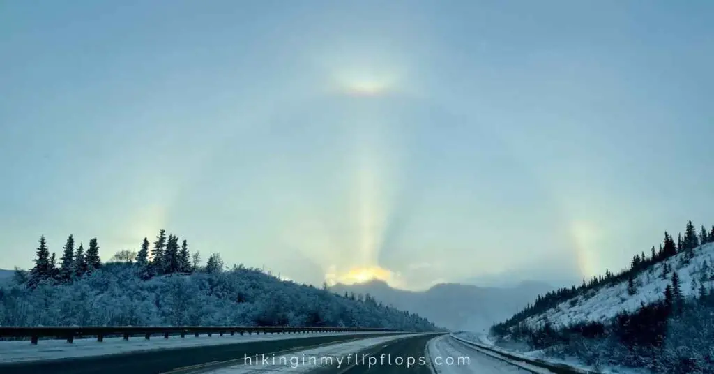 sun dogs, arc, and halo on the horizon near Denali National Park