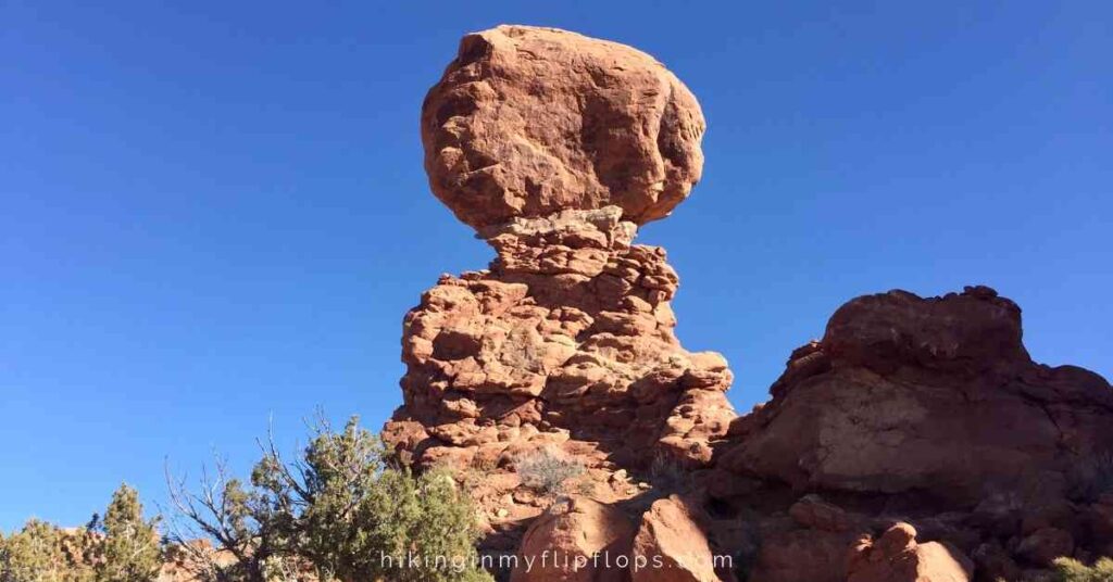 balanced rock in arches np, showing one of the  sights to see at arches national park in one day