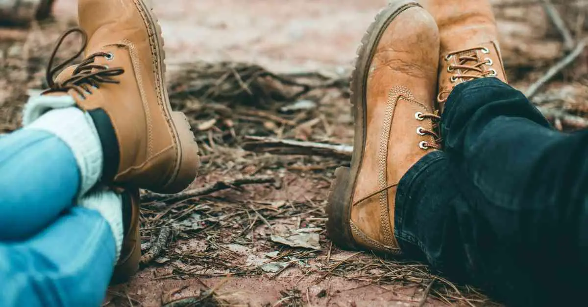 camper's legs shown covered with shoes and clothing as a way to keep mosquitoes from biting