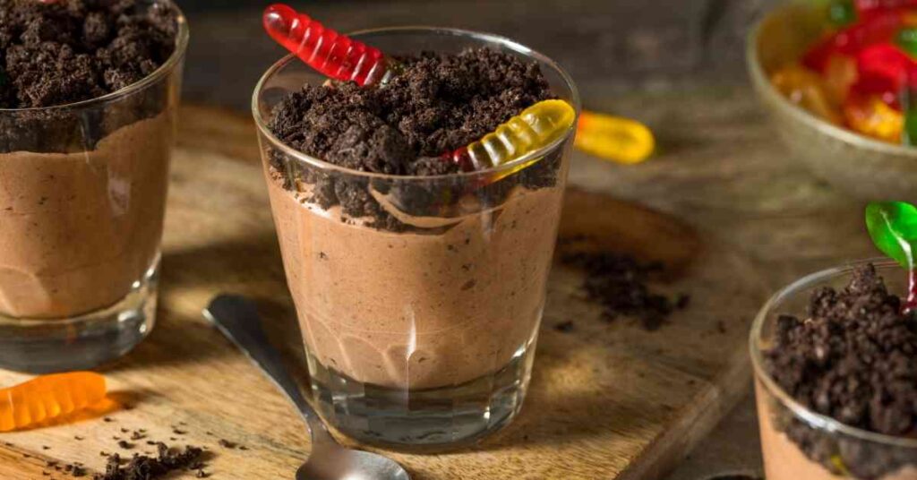 dirt pudding cups with gummy worms are an excellent make-ahead dessert for camping