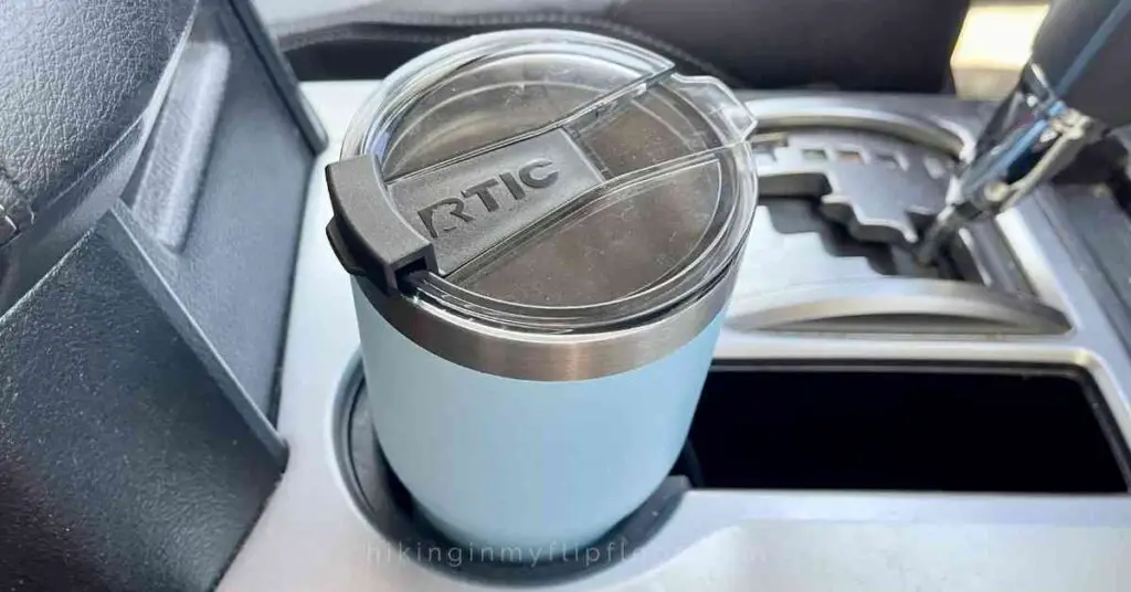 an RTIC tumbler in a car's cup holder for a comparison of the RTIC vs yeti tumbler